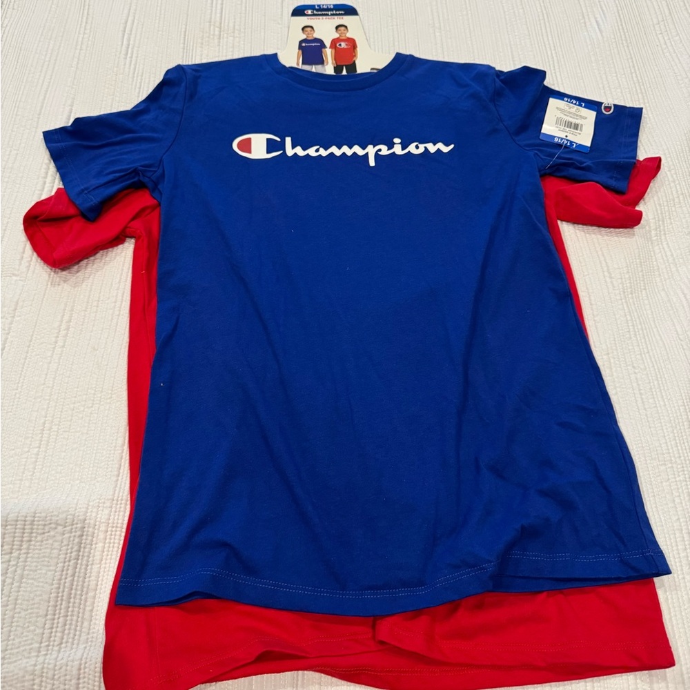 New with tags. Champion Short Sleeve Tees. One Red & One Blue.